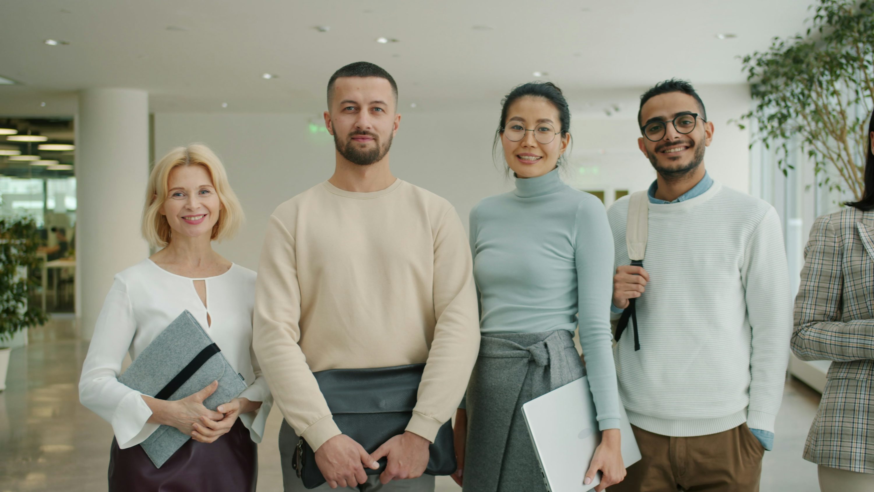 Professional advisory team collaborating in a modern office